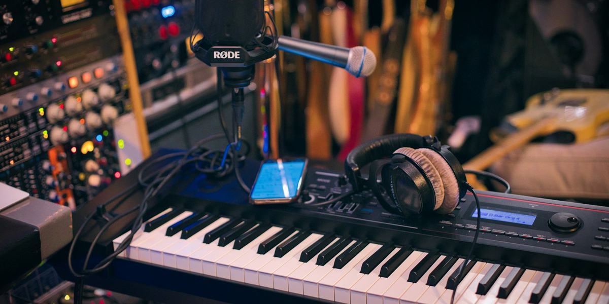 A studio rack of equipment, standing in for a choice between different music models.